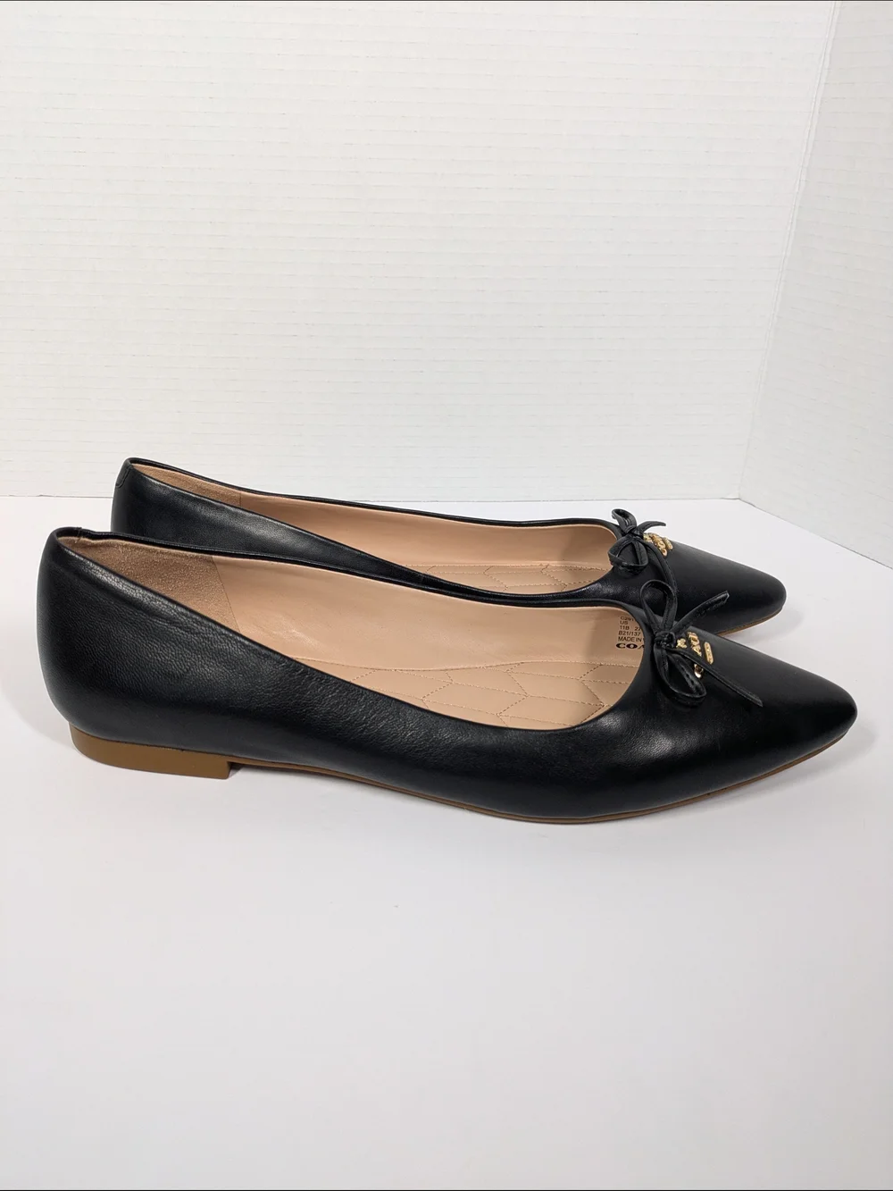 Coach Black Leather Pointed Ballet Flats with Bow and Gold Charm